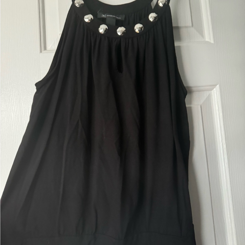 Black Sleeveless Top with Silver Accents